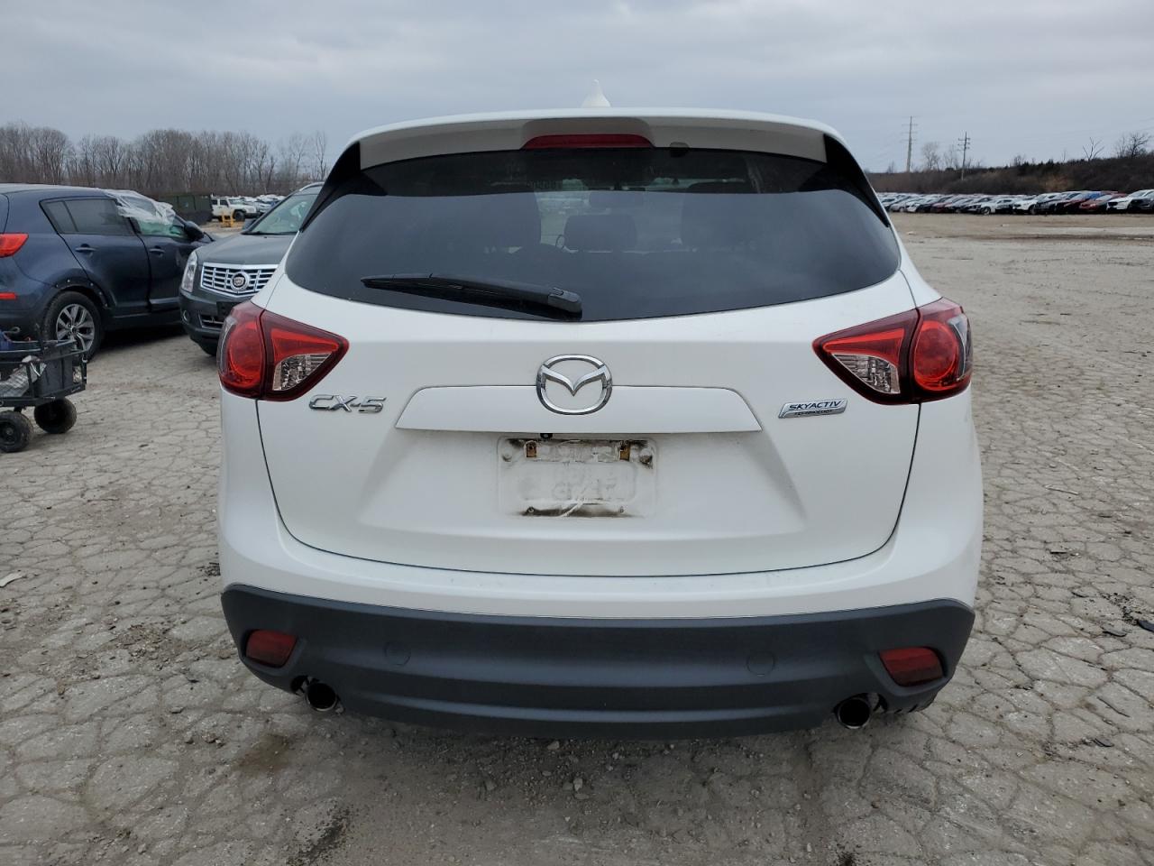 2014 Mazda Cx-5 Touring VIN: JM3KE2CY8E0355018 Lot: 85500234