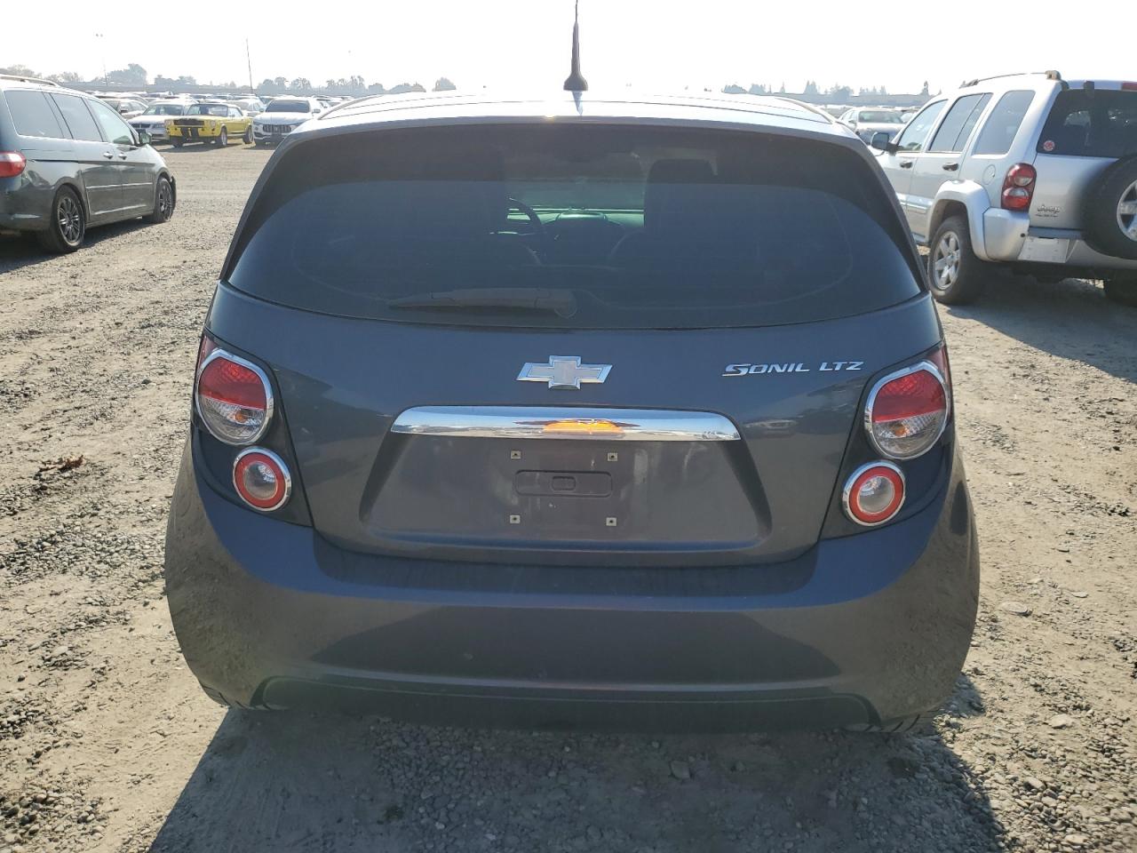 VIN 1G1JE6SG0D4171910 2013 CHEVROLET SONIC no.6