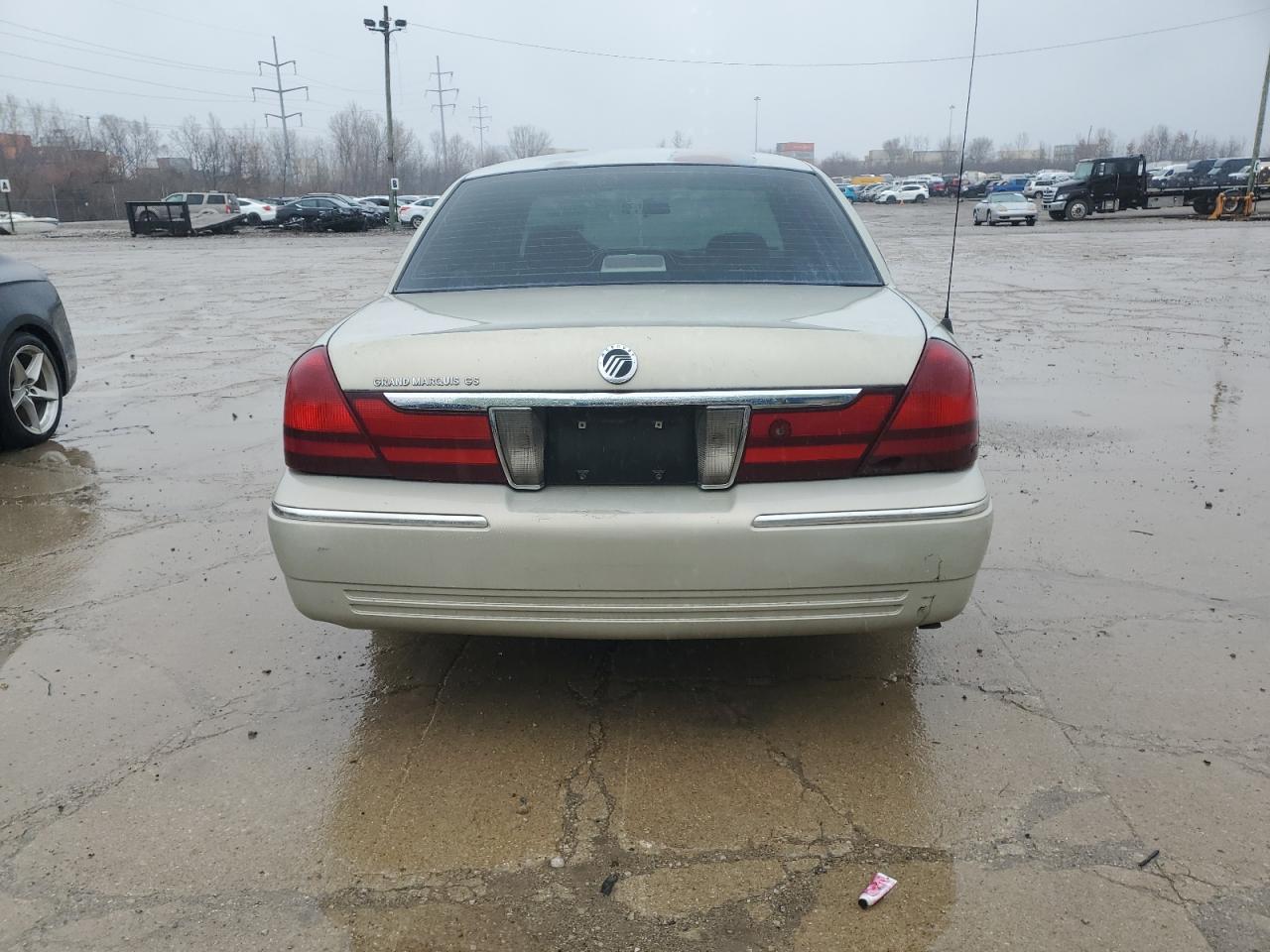 2005 Mercury Grand Marquis Gs VIN: 2MEFM74W25X653734 Lot: 84158454