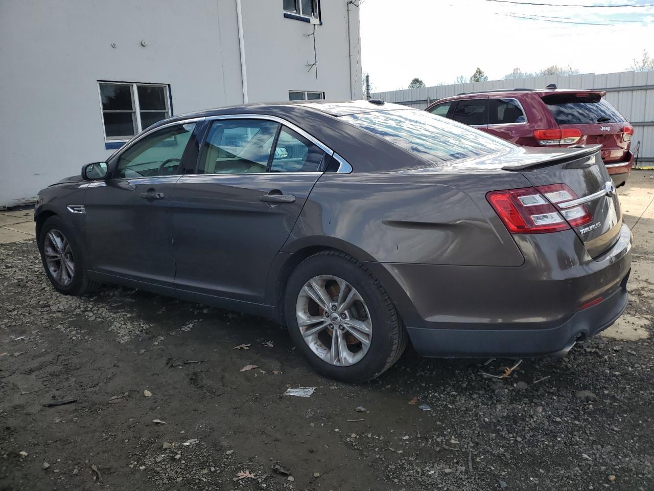 2015 Ford Taurus Sel VIN: 1FAHP2H83FG180116 Lot: 86832414