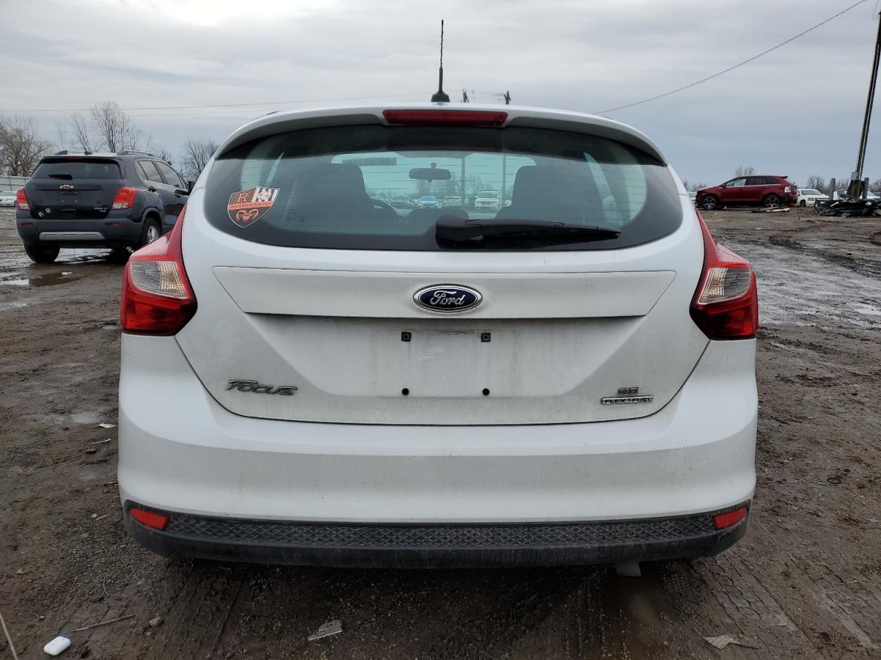 VIN 1FADP3K29EL186677 2014 FORD FOCUS no.6