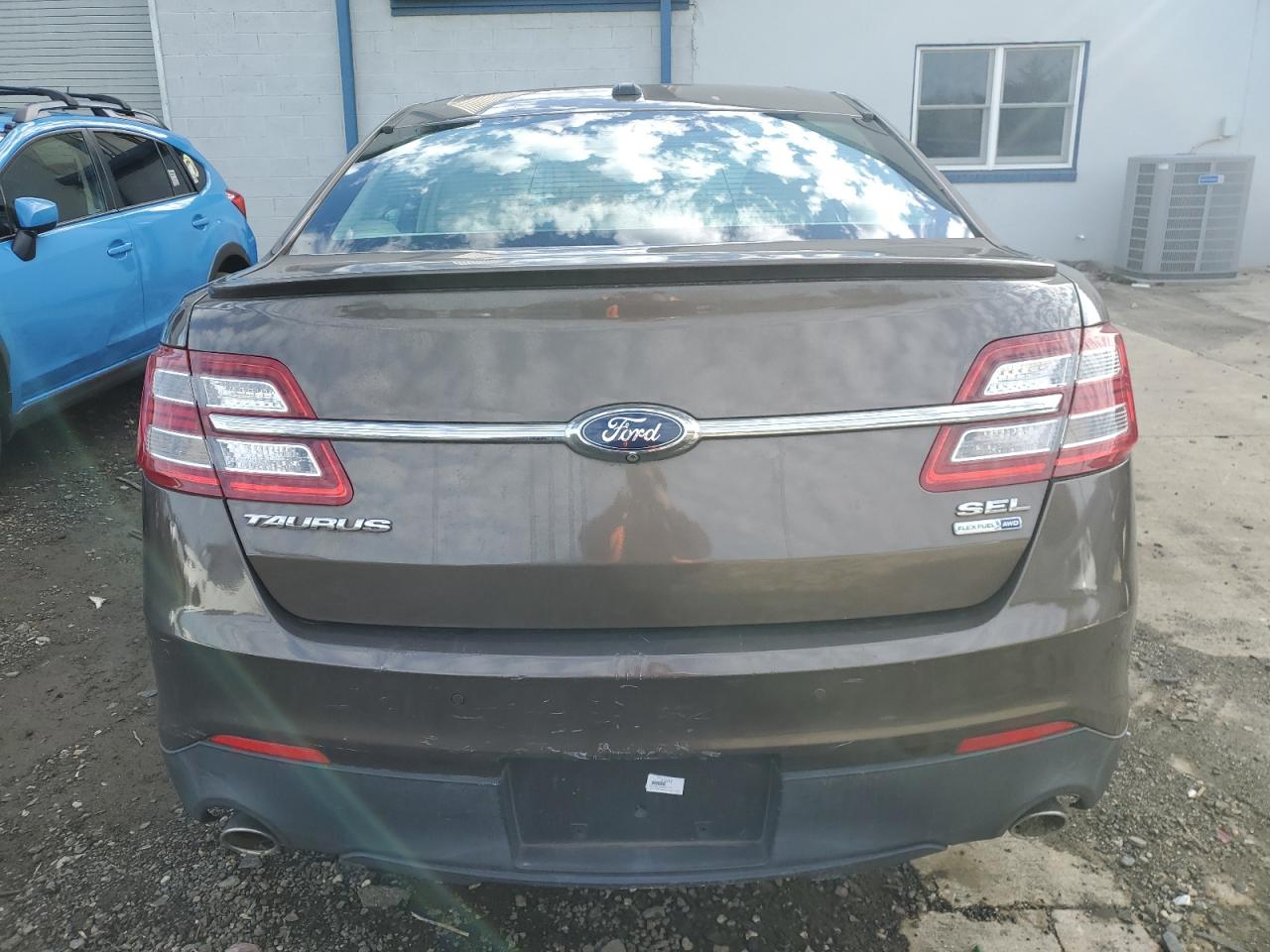 2015 Ford Taurus Sel VIN: 1FAHP2H83FG180116 Lot: 86832414