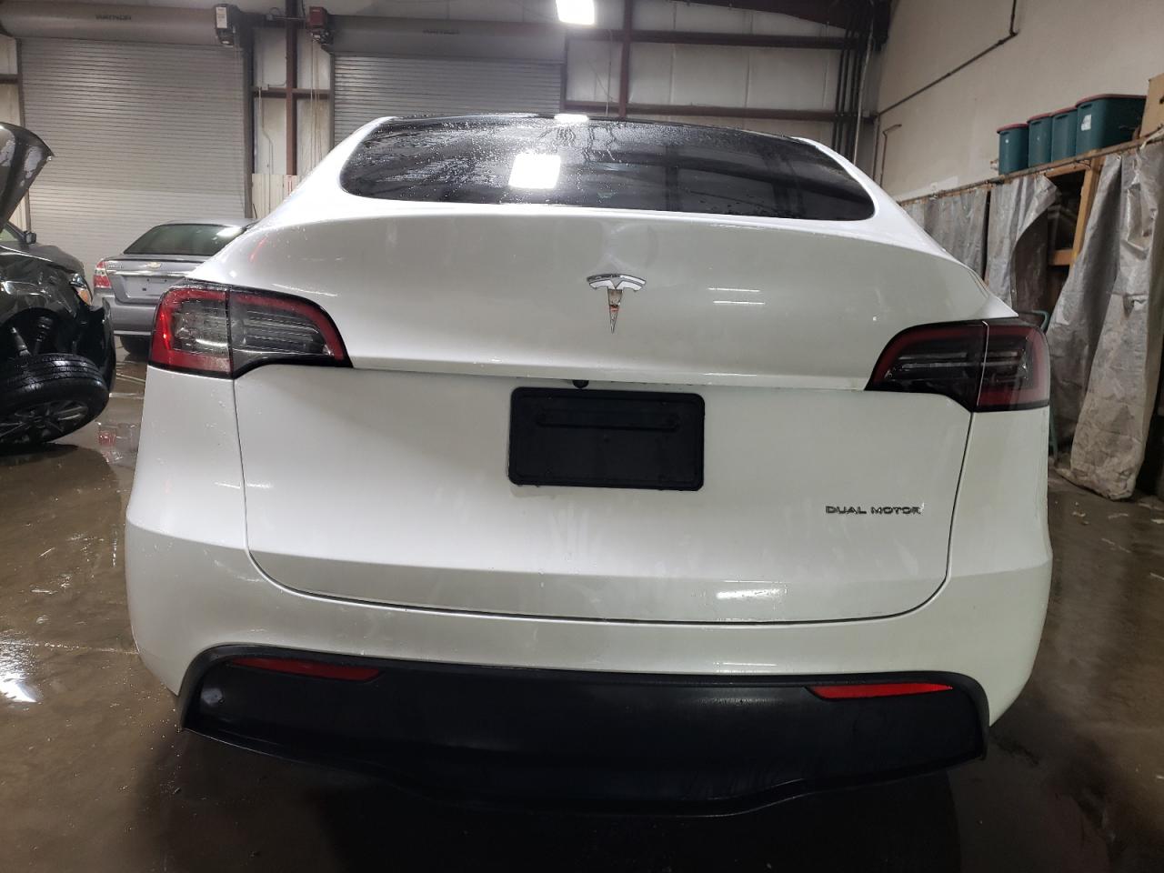 2023 Tesla Model Y VIN: 7SAYGDEE2PF601838 Lot: 82432874