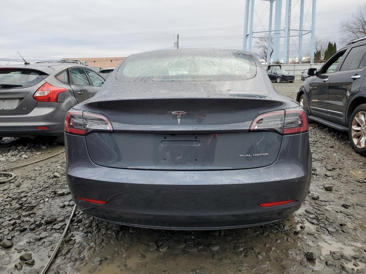 2018 Tesla Model 3 VIN: 5YJ3E1EB4JF115802 Lot: 85286254