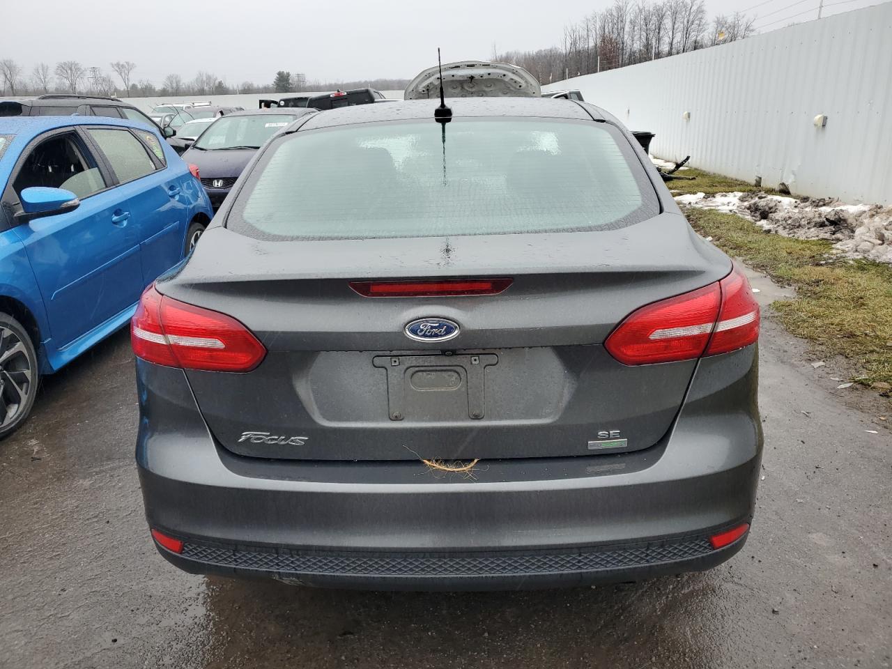 VIN 1FADP3FE2JL214026 2018 FORD FOCUS no.6