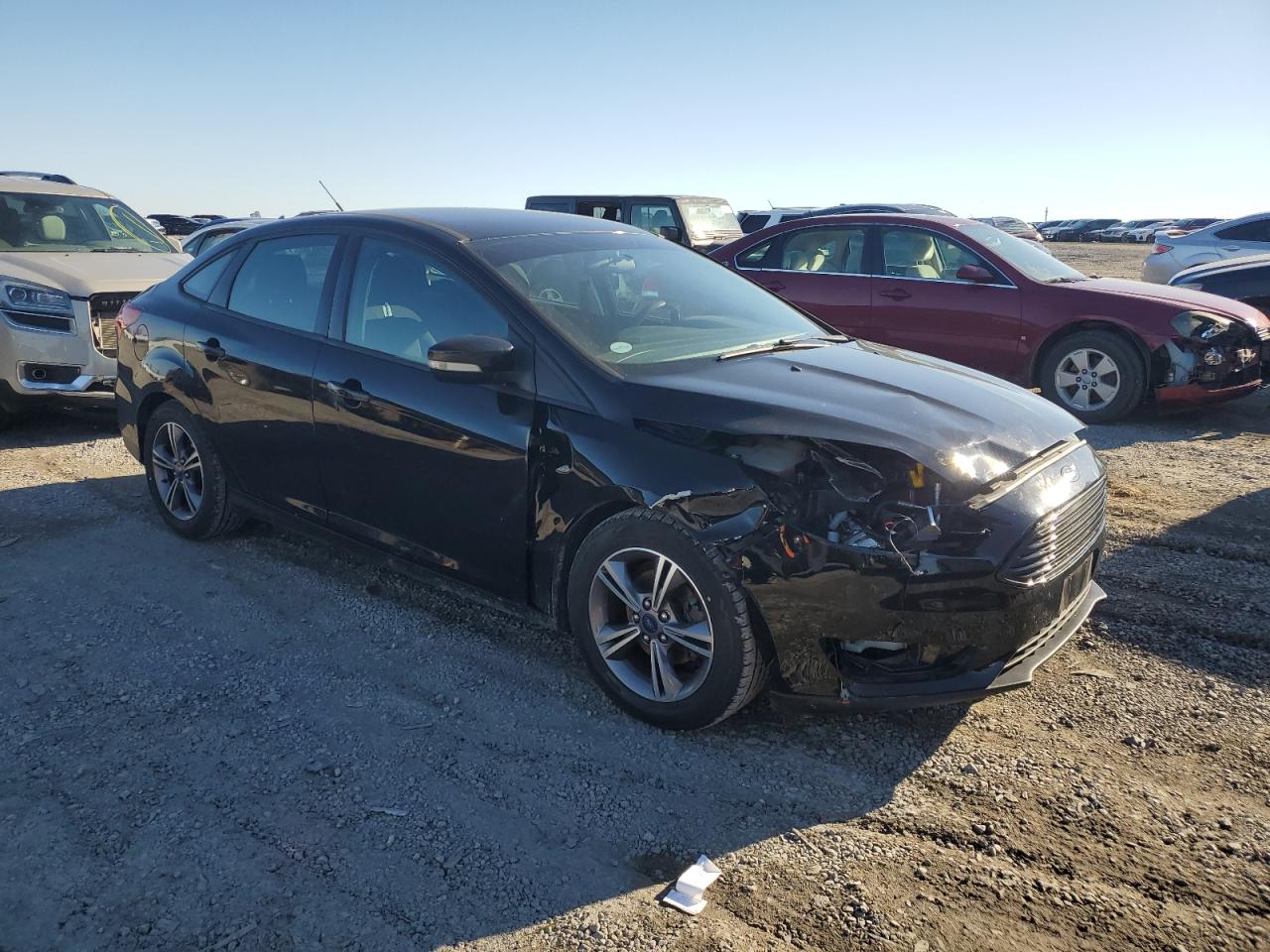 VIN 1FADP3FE9HL256476 2017 FORD FOCUS no.4