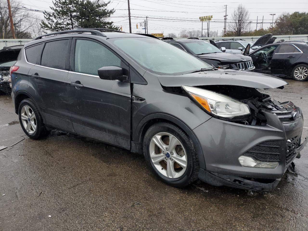 VIN 1FMCU9GX1GUC08489 2016 FORD ESCAPE no.4