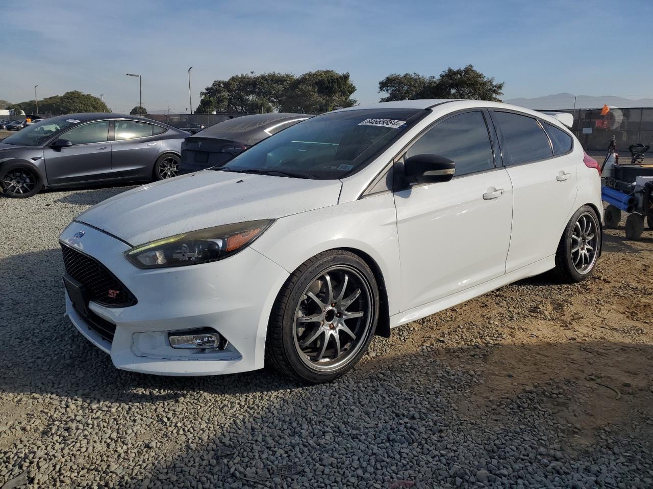 VIN 1FADP3L90GL399192 2016 FORD FOCUS no.1