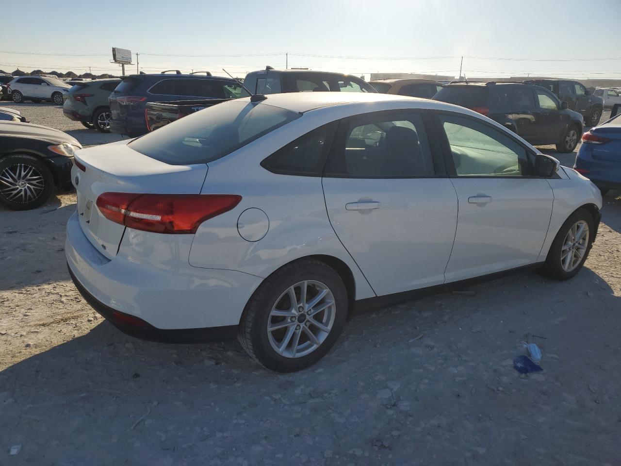 VIN 1FADP3F28HL218842 2017 FORD FOCUS no.3