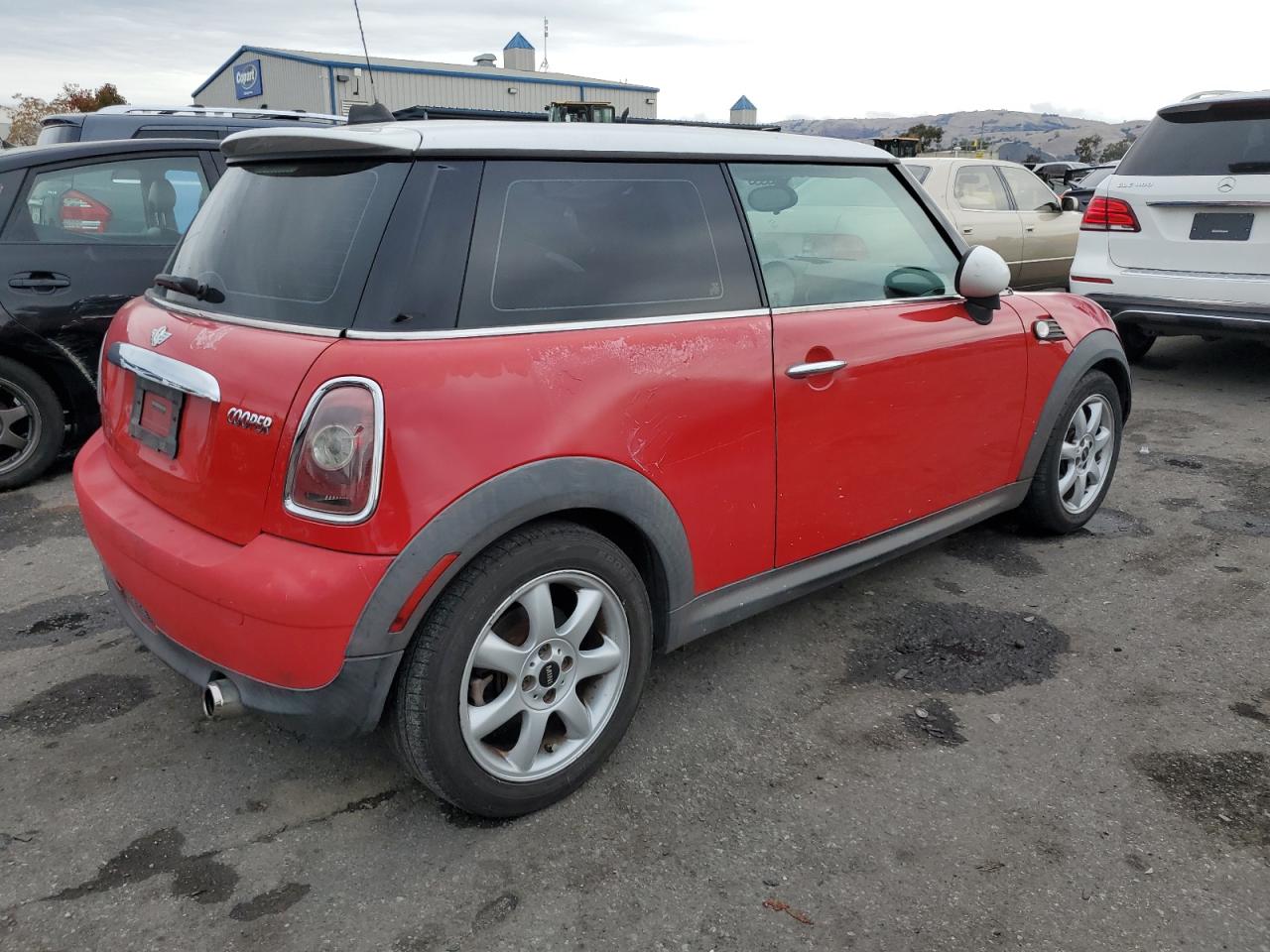 2009 Mini Cooper VIN: WMWMF33549TU70792 Lot: 60996495