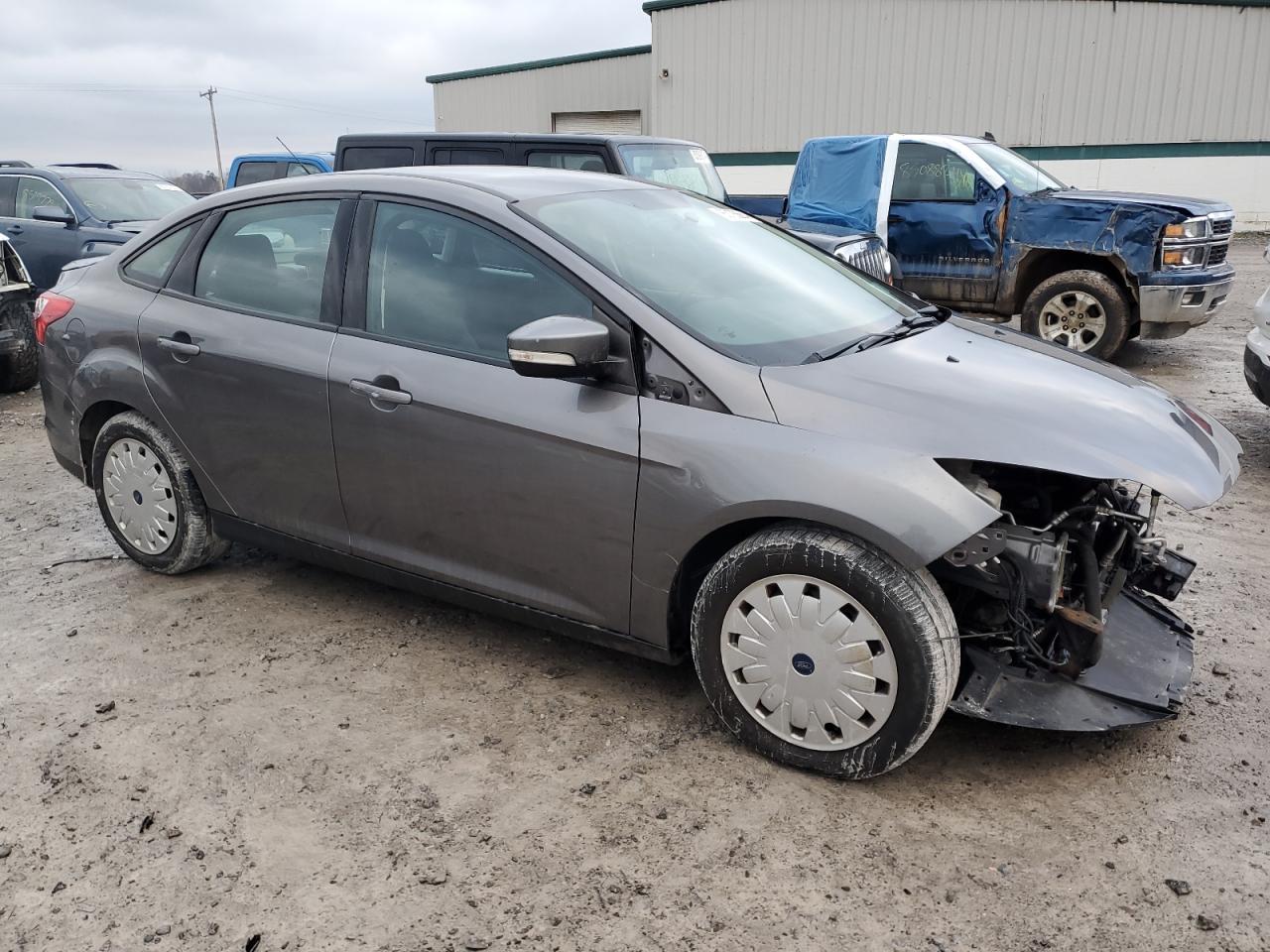 VIN 1FADP3F23EL217108 2014 FORD FOCUS no.4