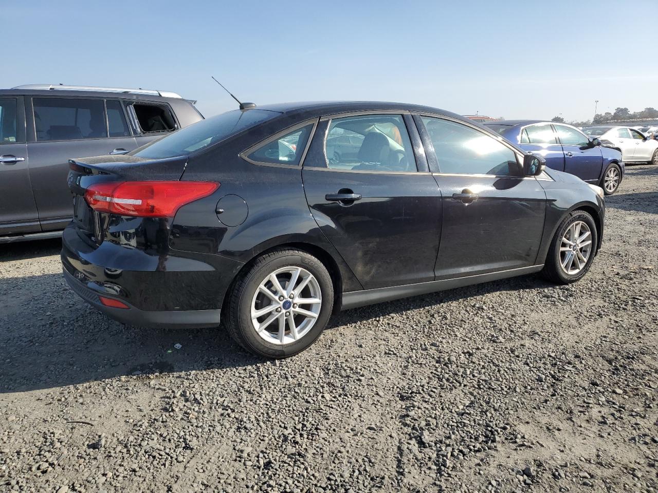 VIN 1FADP3F23GL264254 2016 FORD FOCUS no.3