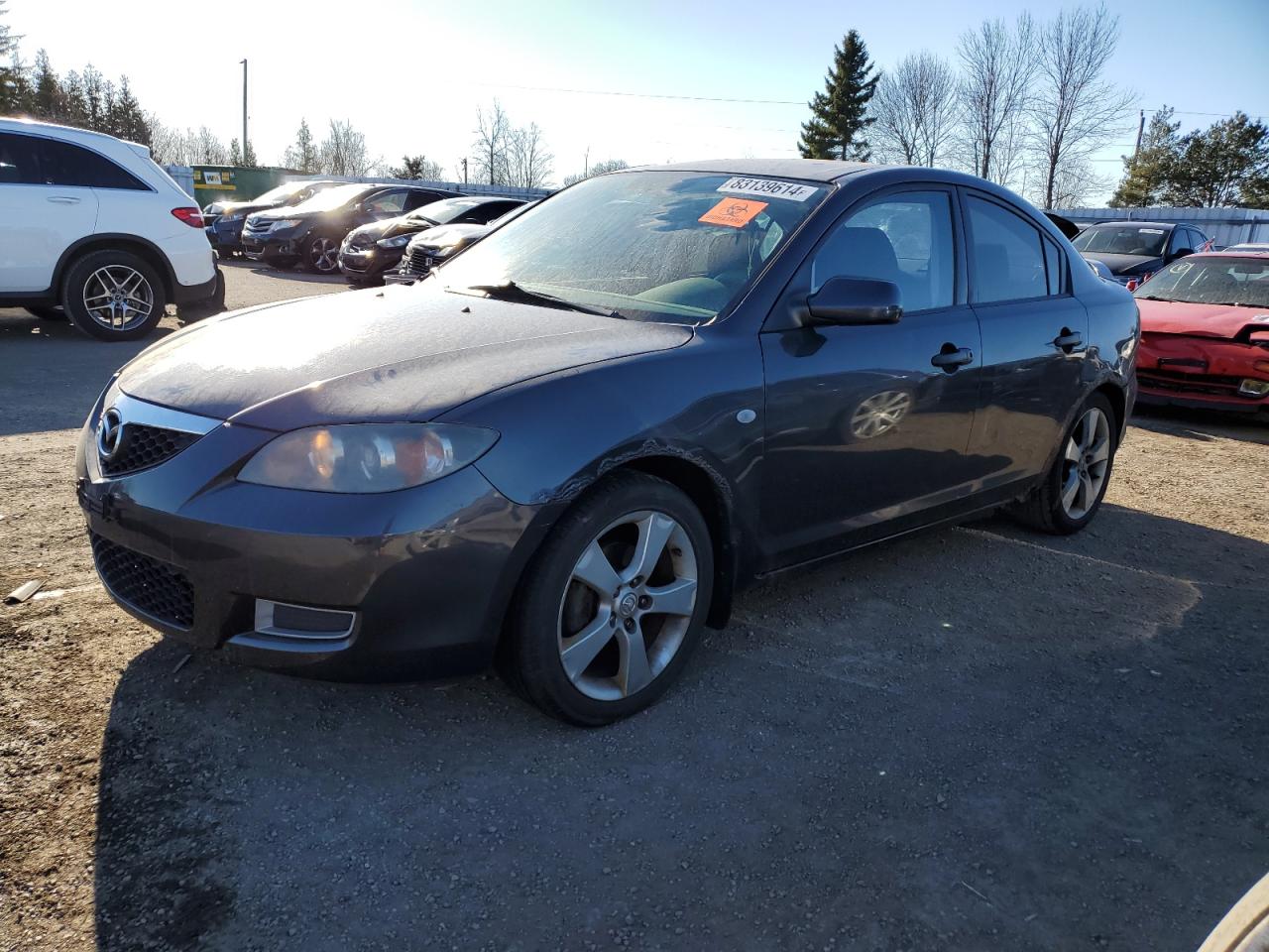 2007 Mazda 3 I charcoal sedan gas JM1BK32F971717152 photo #1