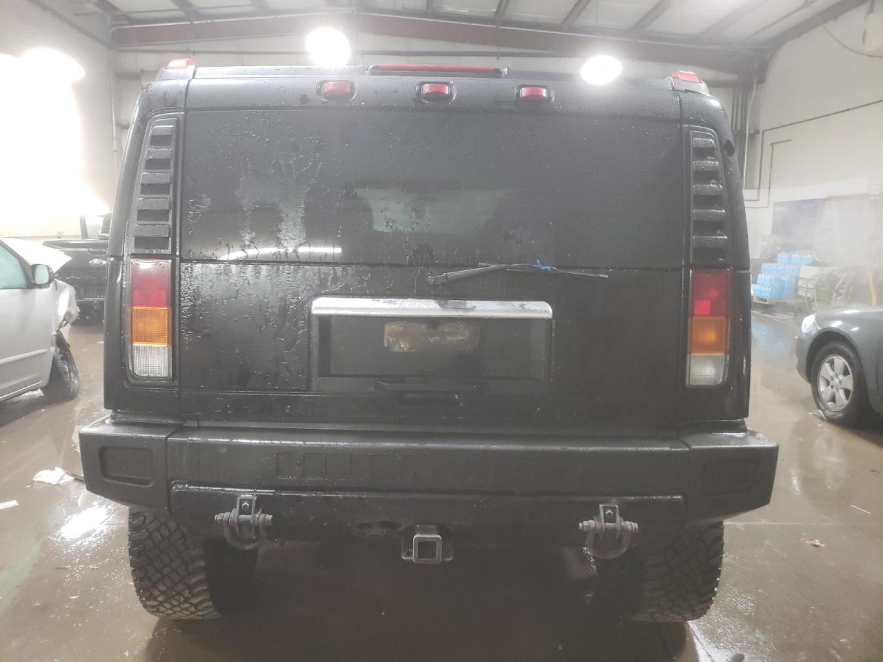 2003 Hummer H2 VIN: 5GRGN23U33H143023 Lot: 84403414
