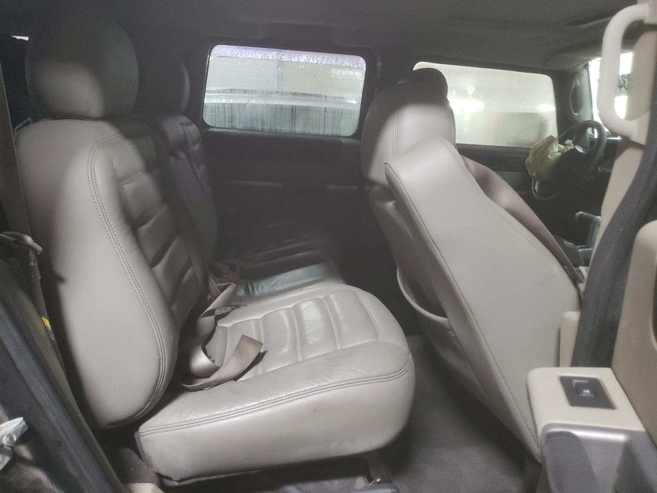 2003 Hummer H2 VIN: 5GRGN23U33H143023 Lot: 84403414