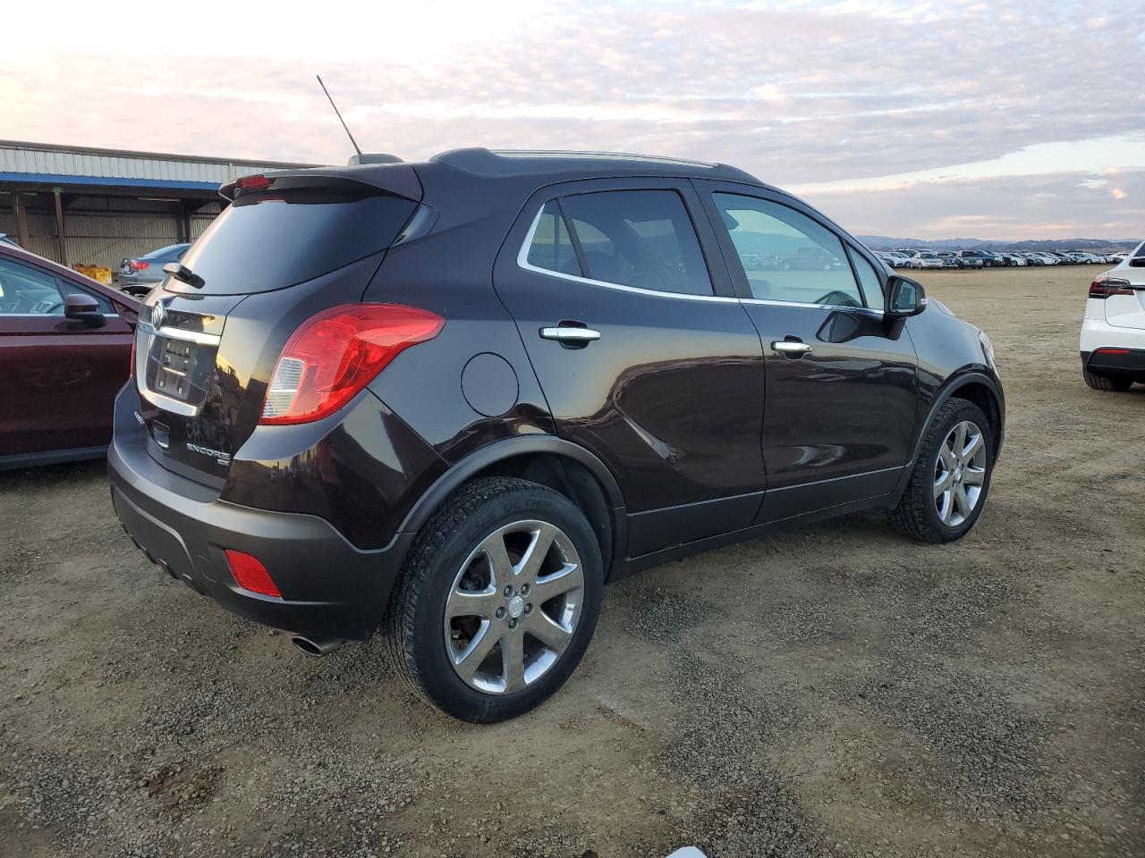 2015 BUICK ENCORE with MINOR DENT/SCRATCHES damage, VIN KL4CJGSB6FB000092