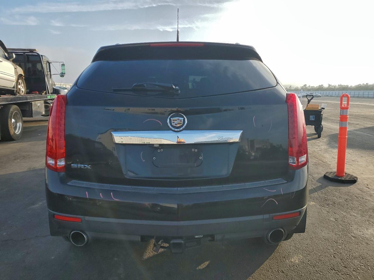 2011 Cadillac Srx VIN: 3GYFNGEYXBS518397 Lot: 95575535