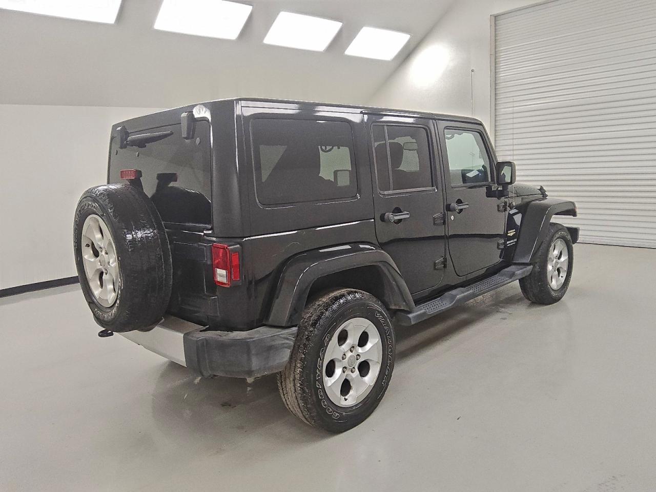 2014 Jeep Wrangler Unlimited Sahara VIN: 1C4HJWEG2EL290613 Lot: 94779825