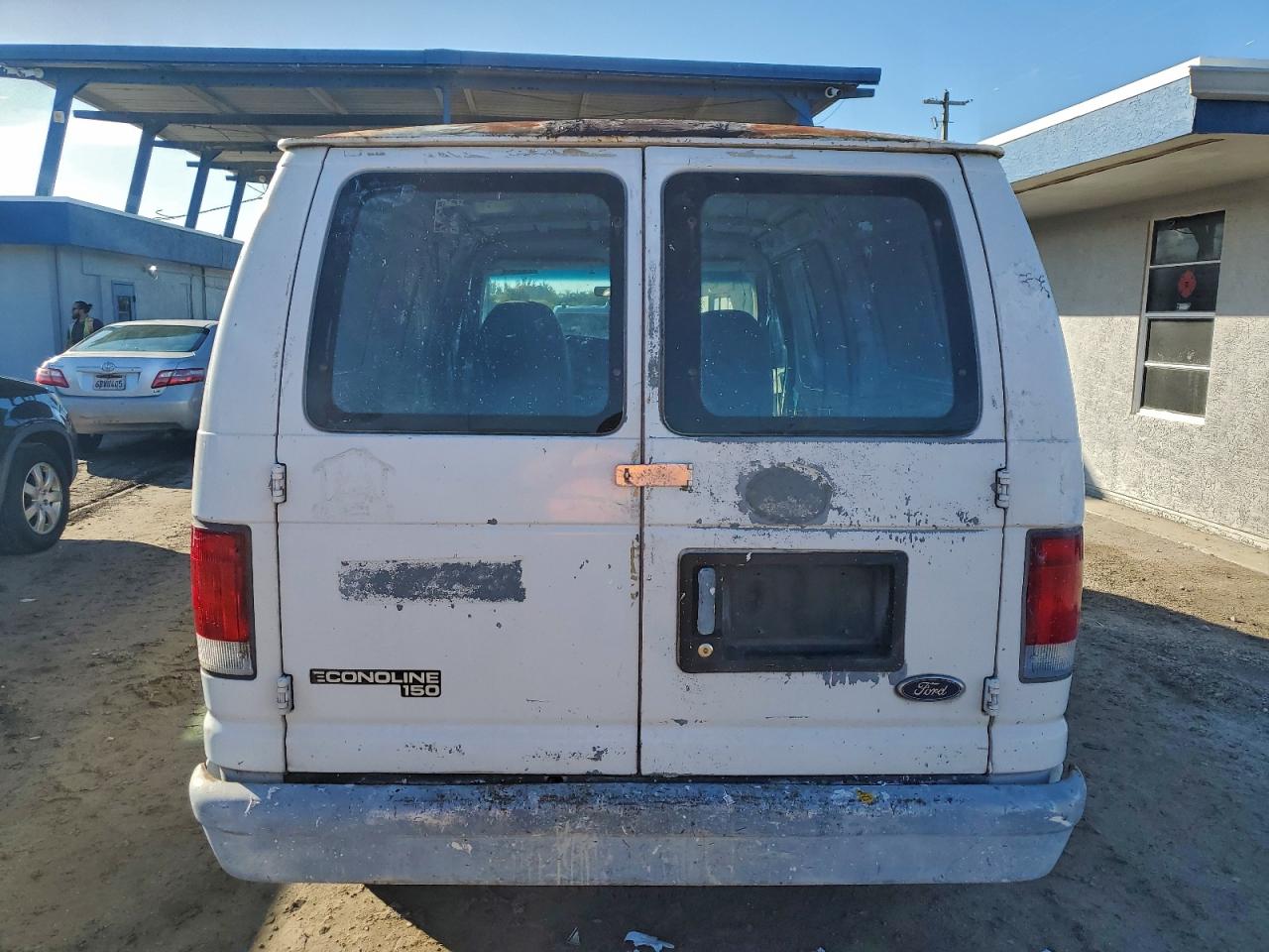 1998 Ford Econoline E150 Van VIN: 1FTRE1424WHA76812 Lot: 96142585