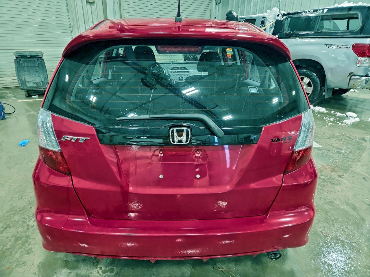 2011 Honda Fit Sport VIN: JHMGE8H5XBC001557 Lot: 94670055