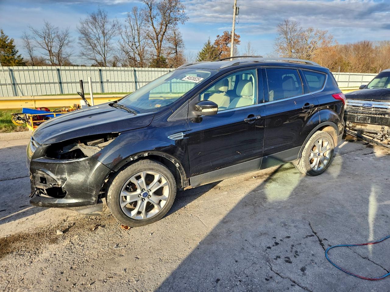 2014 Ford Escape Titanium VIN: 1FMCU0JX1EUD08769 Lot: 94525525