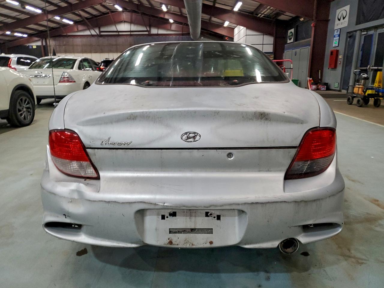 2000 Hyundai Tiburon VIN: KMHJG25F4YU158009 Lot: 94780675