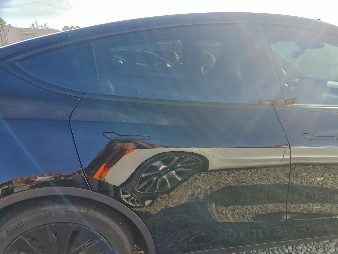 2023 Tesla Model Y VIN: 7SAYGDEE2PA146549 Lot: 95877645