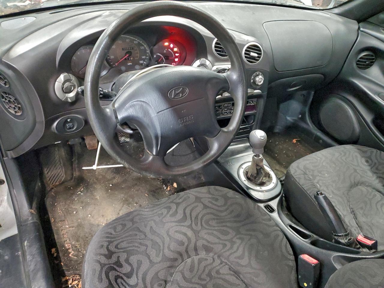 2000 Hyundai Tiburon VIN: KMHJG25F4YU158009 Lot: 94780675