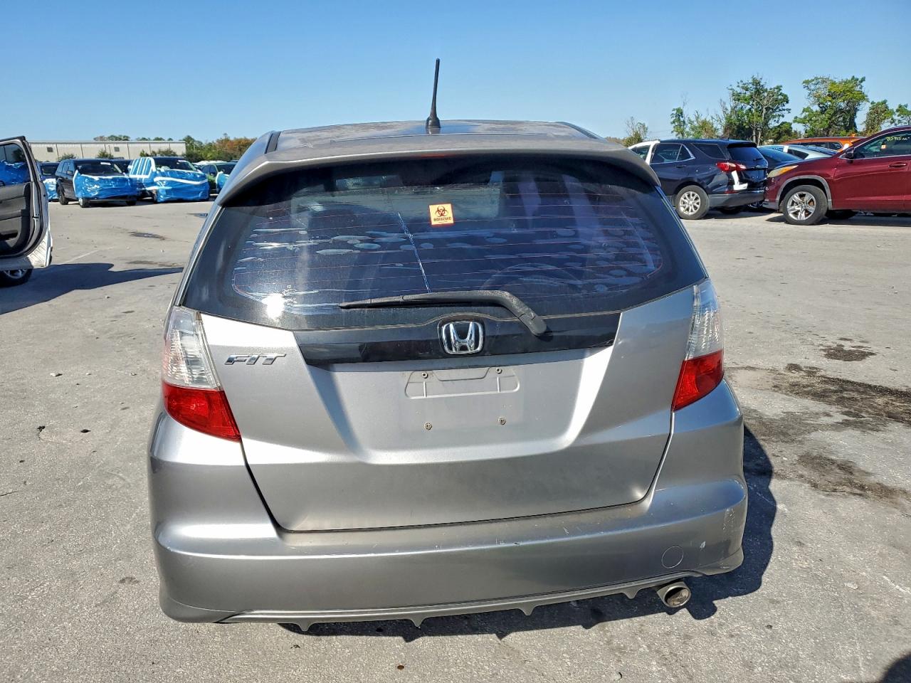 2009 Honda Fit Sport VIN: JHMGE88459C007414 Lot: 96312345