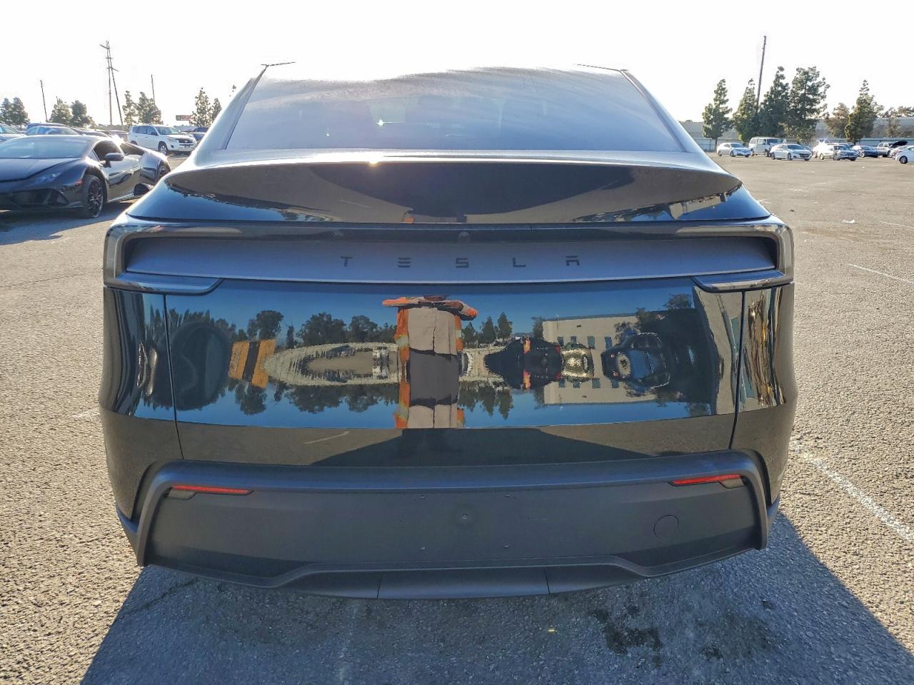 2026 Tesla Model Y VIN: 7SAYGDEDXTF516716 Lot: 94454375