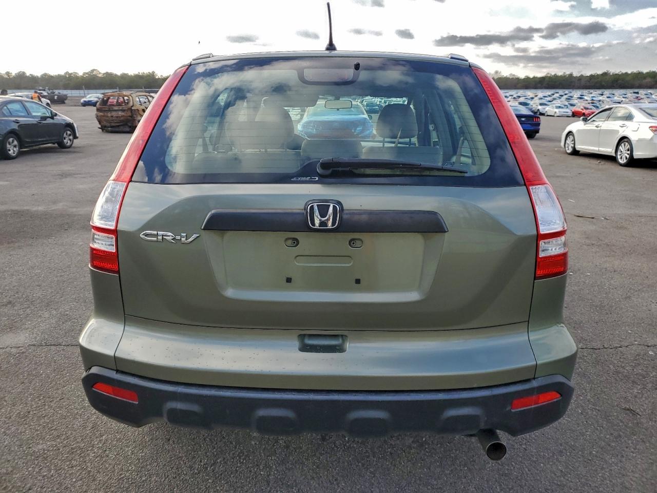 2009 Honda Cr-V Lx VIN: JHLRE48319C015930 Lot: 94633575
