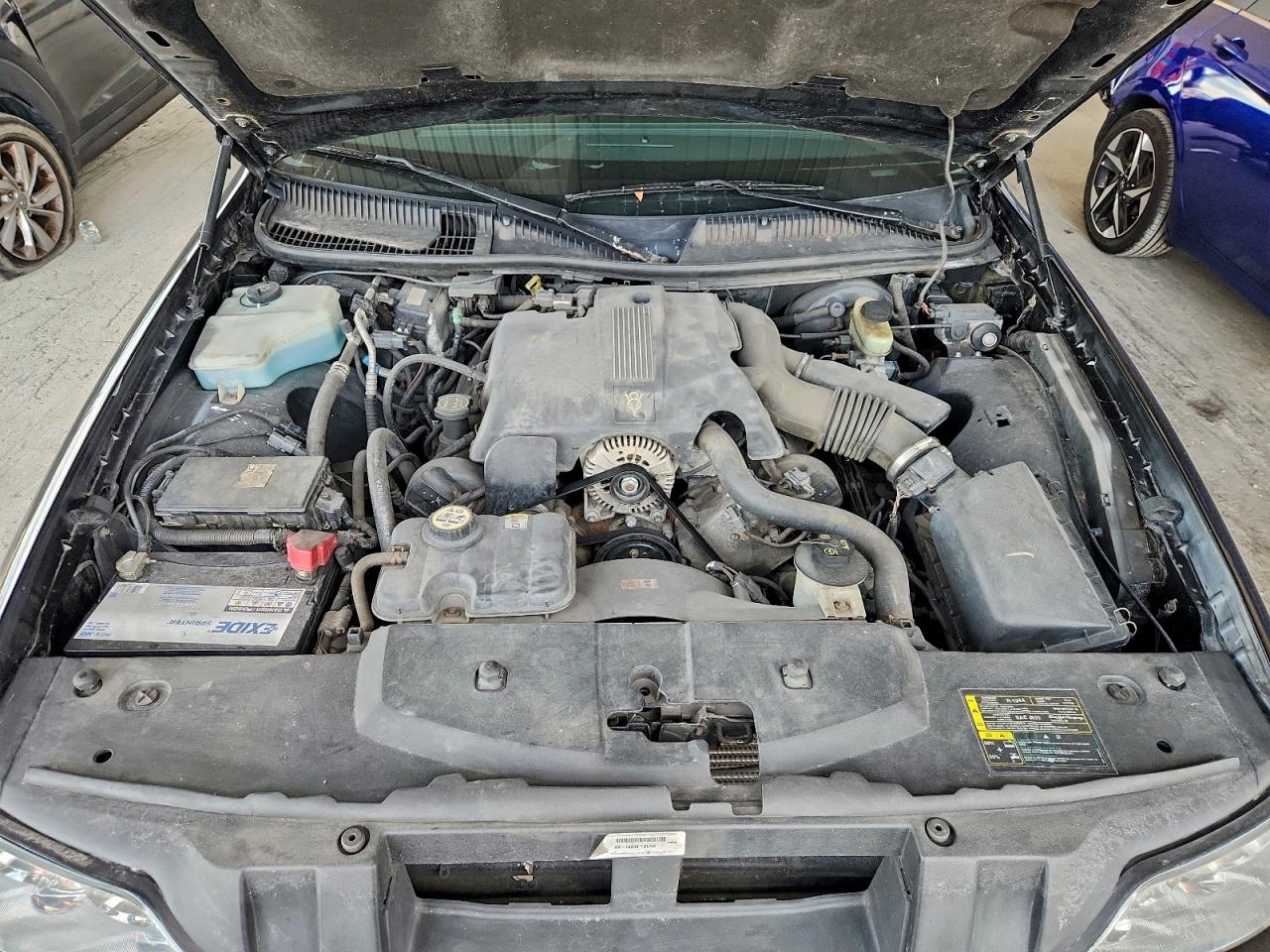 2003 Lincoln Town Car Signature VIN: 1LNHM82W13Y614340 Lot: 95391875