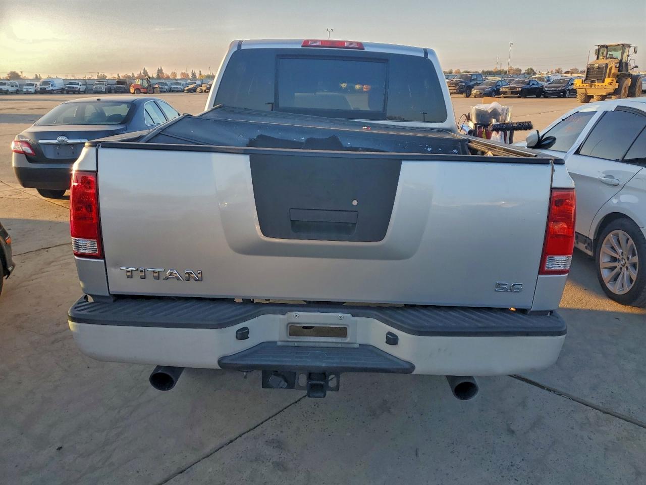 2010 Niss Titan Xe VIN: 1N6AA0EK6AN312823 Lot: 94307195