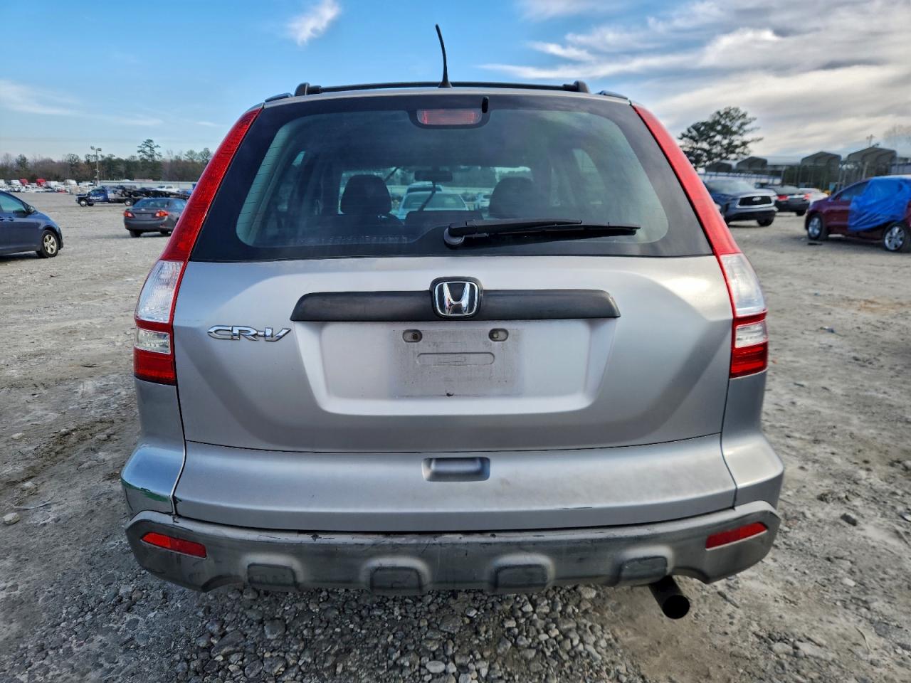 2007 Honda Cr-V Lx VIN: JHLRE38397C027766 Lot: 96595035