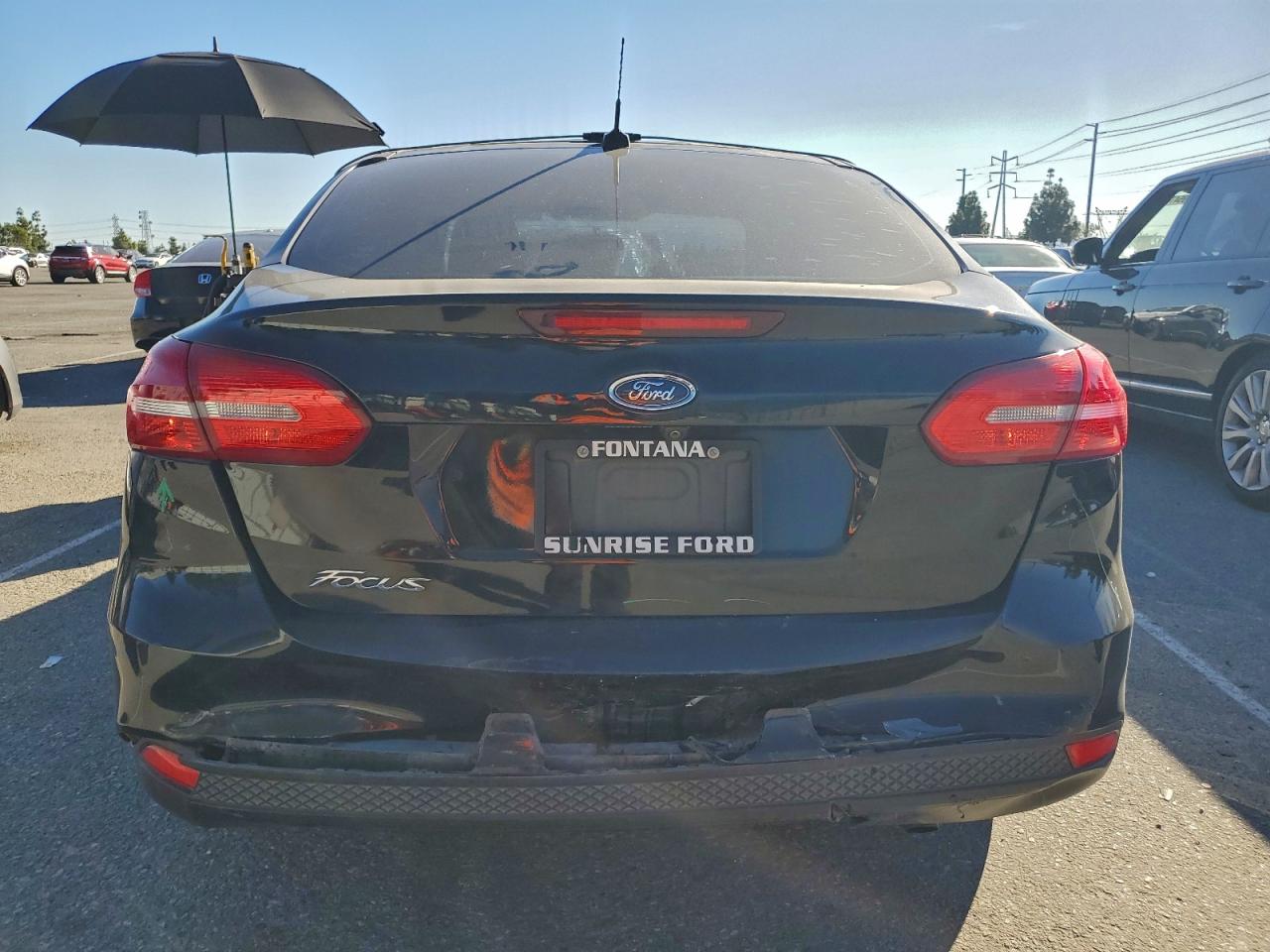 2018 Ford Focus S VIN: 1FADP3E29JL304054 Lot: 95289235