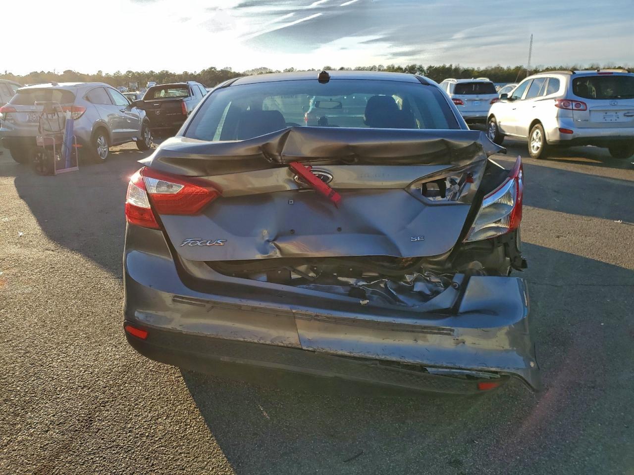 2014 Ford Focus Se VIN: 1FADP3F23EL297557 Lot: 95316335