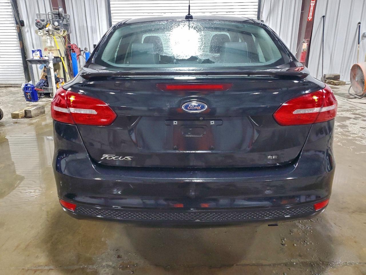 2015 Ford Focus Se VIN: 1FADP3F28FL379110 Lot: 95897175