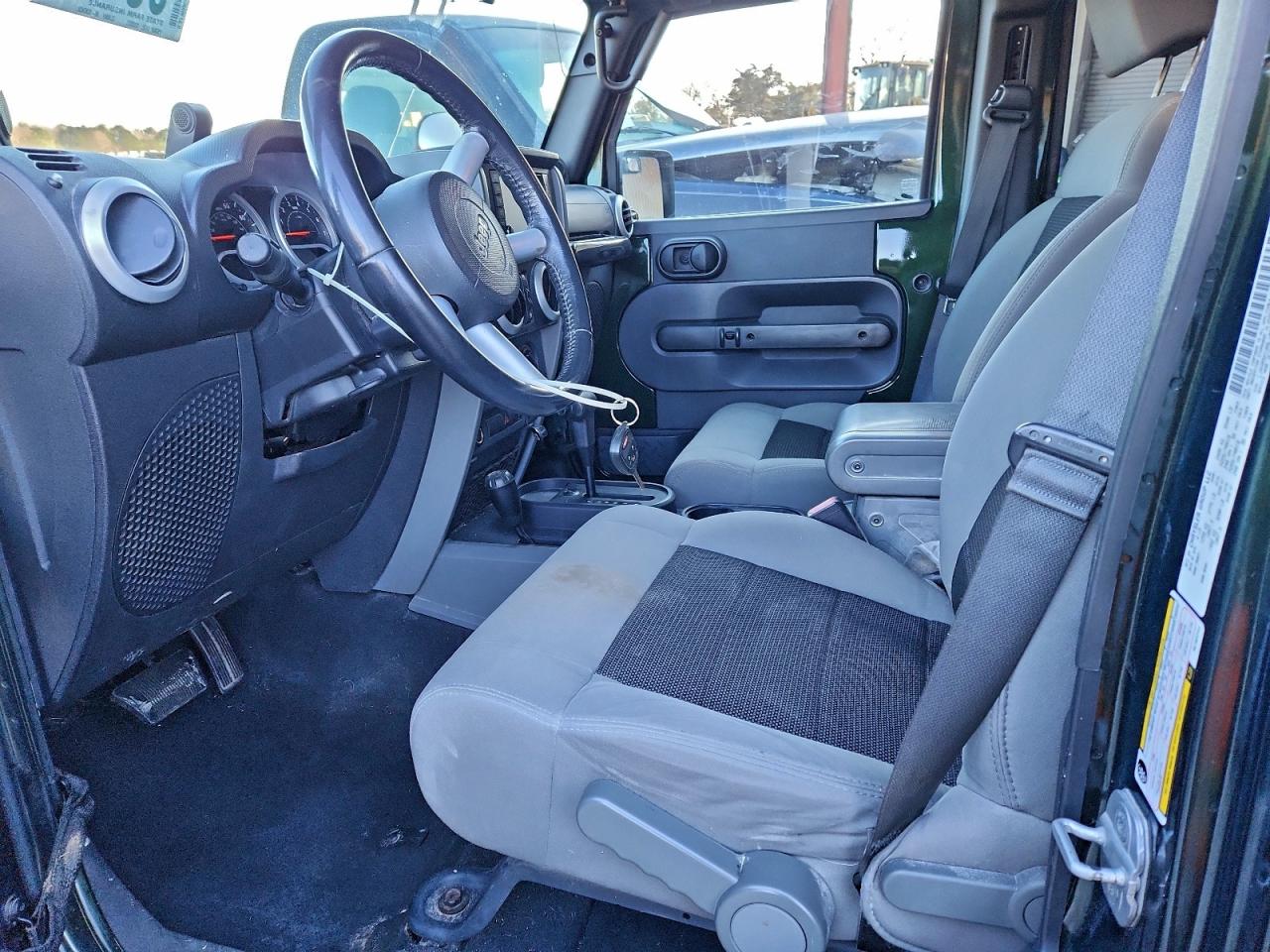 2010 Jeep Wrangler Unlimited Sahara VIN: 1J4HA5H18AL181711 Lot: 95140815