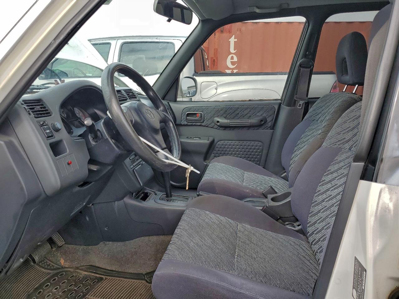 1999 Toyota Rav4 VIN: JT3GP10V5X7058235 Lot: 94406675