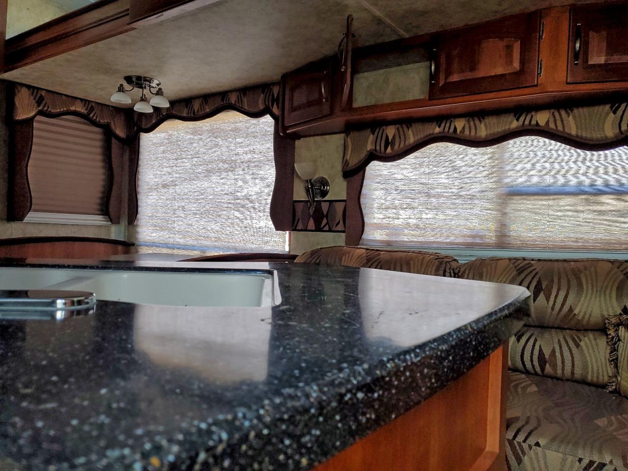 2011 Cougar Trav Trail VIN: 4YDF3242XB2507307 Lot: 94316085