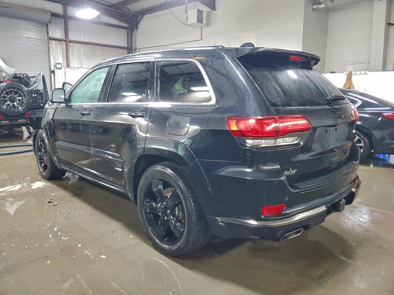 2016 Jeep Grand Cherokee Overland VIN: 1C4RJFCG9GC425936 Lot: 97849255