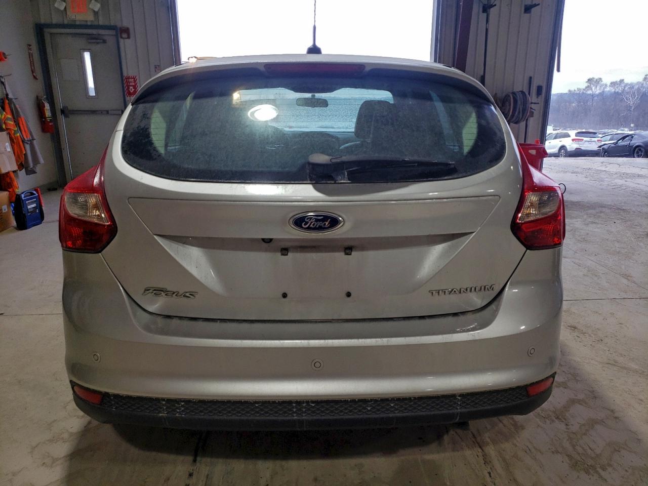 2014 Ford Focus Titanium VIN: 1FADP3N24EL422812 Lot: 95954545