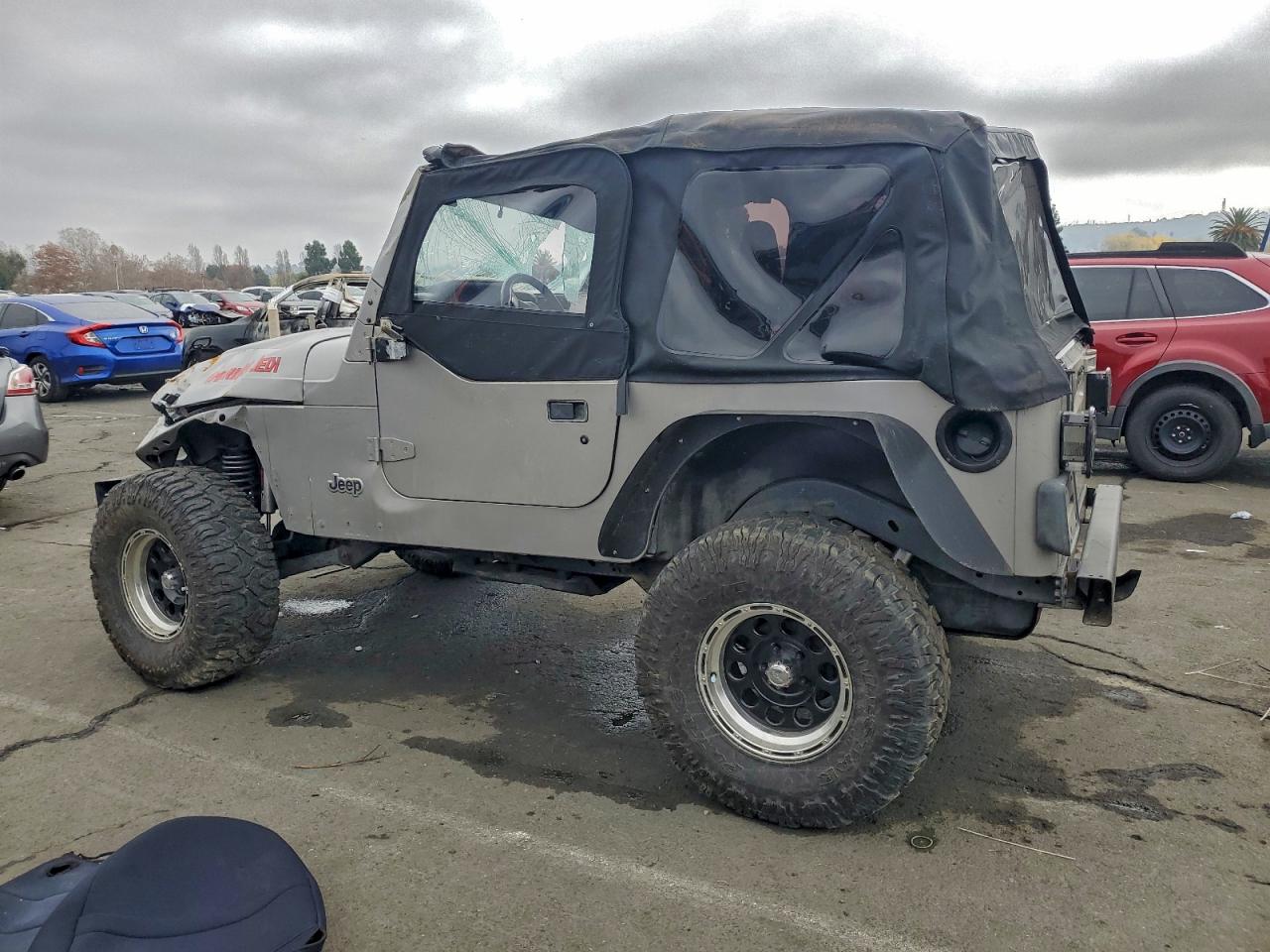 2000 Jeep Wrangler / Tj Sport VIN: 1J4FA49S6YP713498 Lot: 97721575