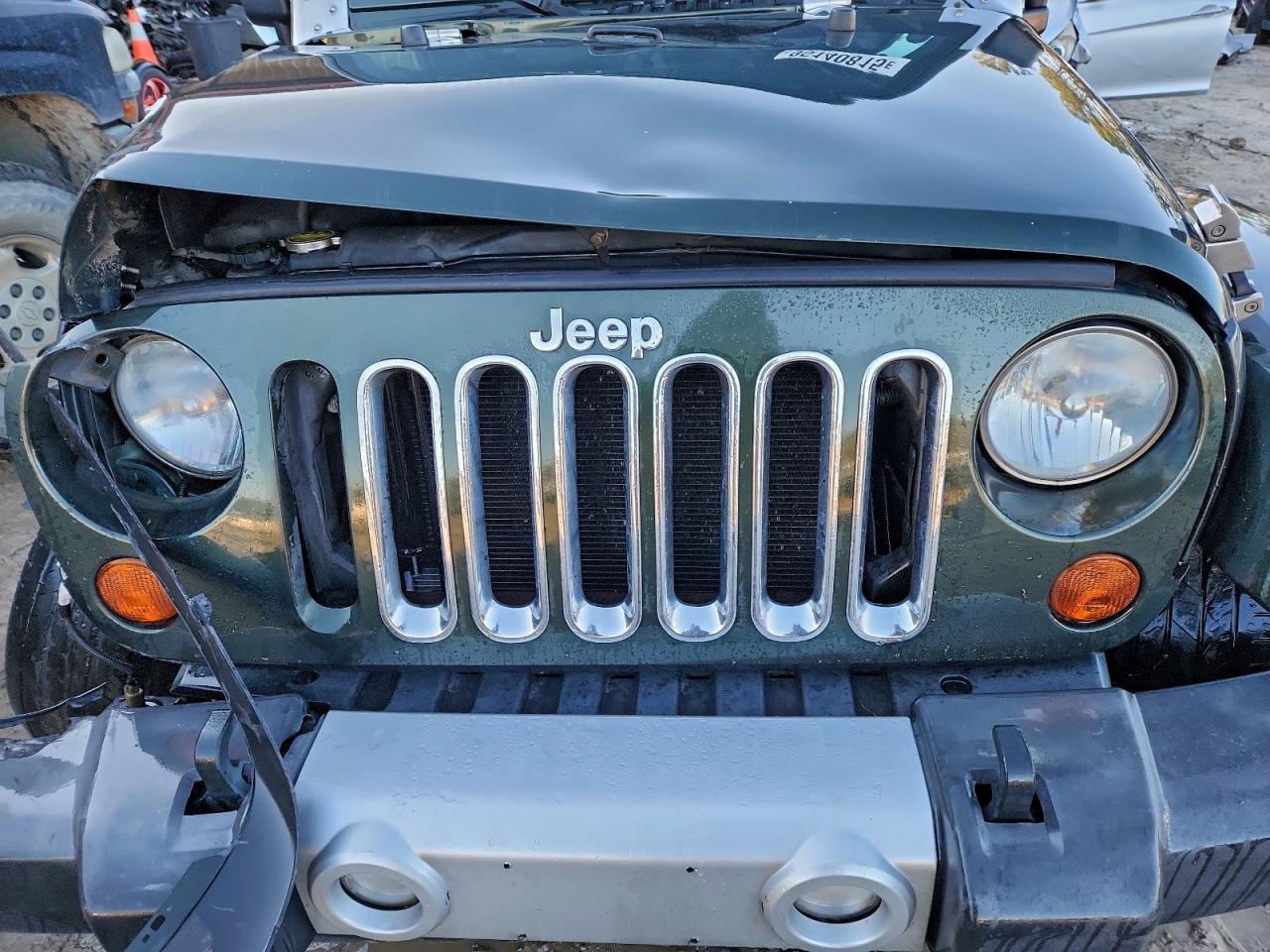 2010 Jeep Wrangler Unlimited Sahara VIN: 1J4HA5H18AL181711 Lot: 95140815