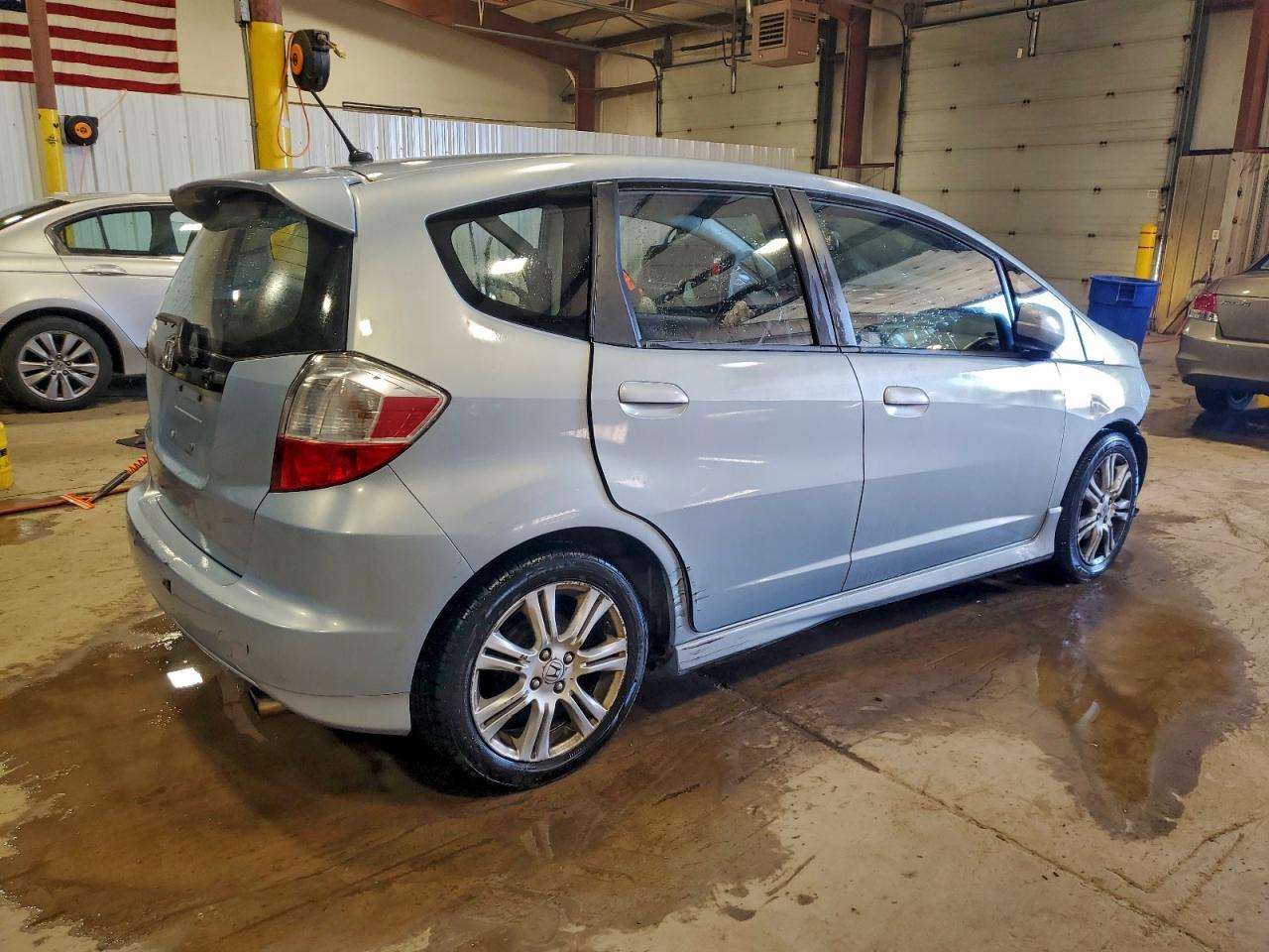 2009 Honda Fit Sport VIN: JHMGE88489S021801 Lot: 98160205
