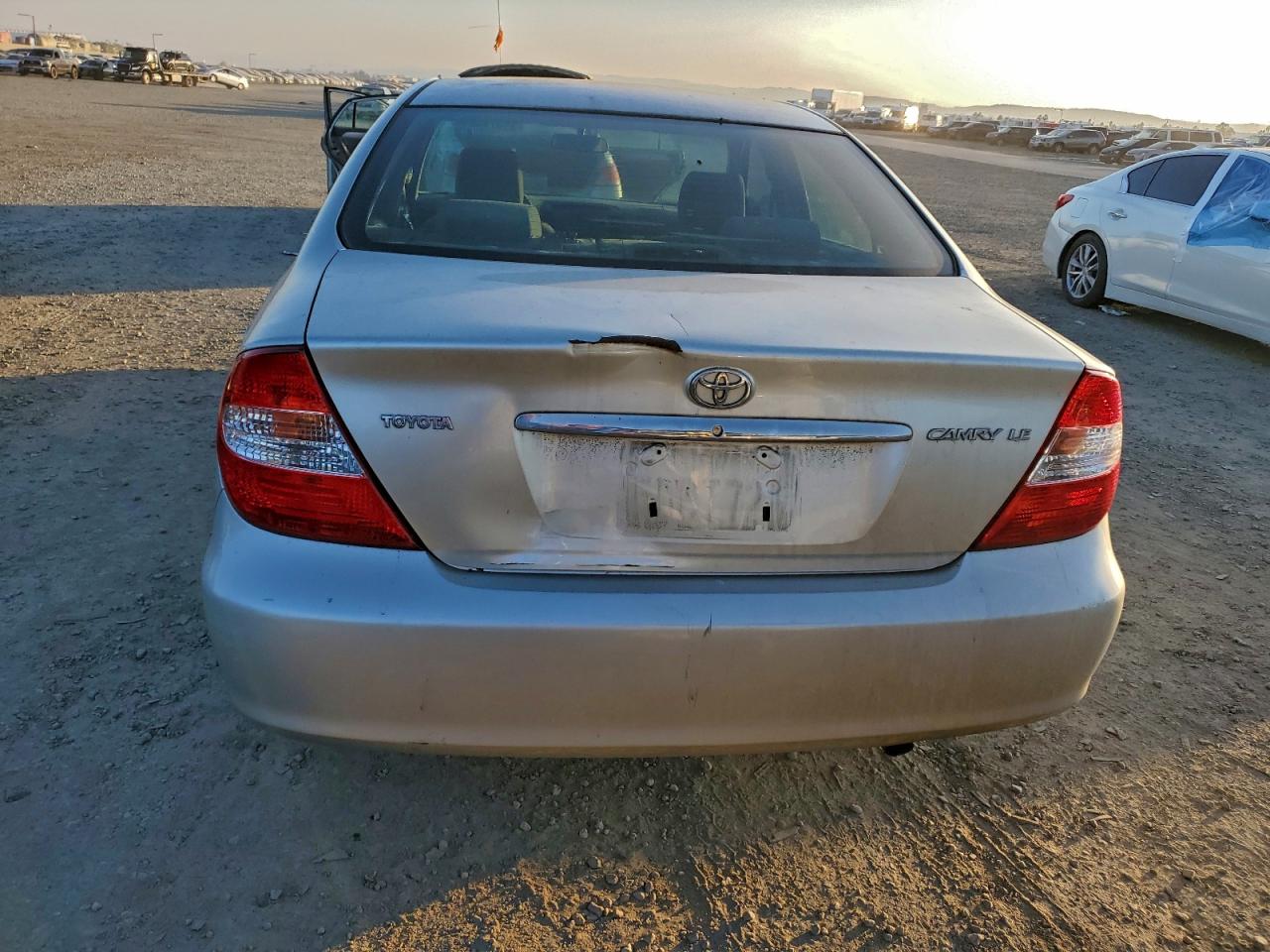 2003 Toyota Camry Le VIN: JTDBE32K130228345 Lot: 94379325