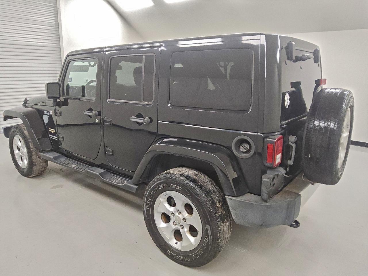 2014 Jeep Wrangler Unlimited Sahara VIN: 1C4HJWEG2EL290613 Lot: 94779825