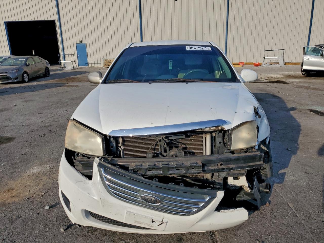 2006 Kia Spectra Lx VIN: KNAFE121365339402 Lot: 95479675