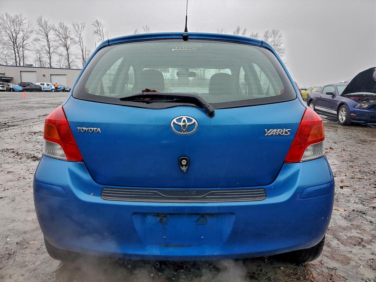 2009 Toyota Yaris VIN: JTDKT903395256423 Lot: 96679665