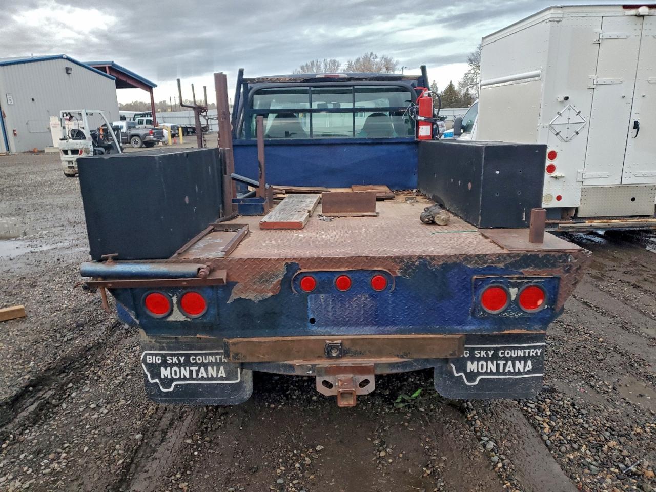 1999 Ford F250 Flatbed Truck VIN: 1FTNX21L7XEC18956 Lot: 96013095